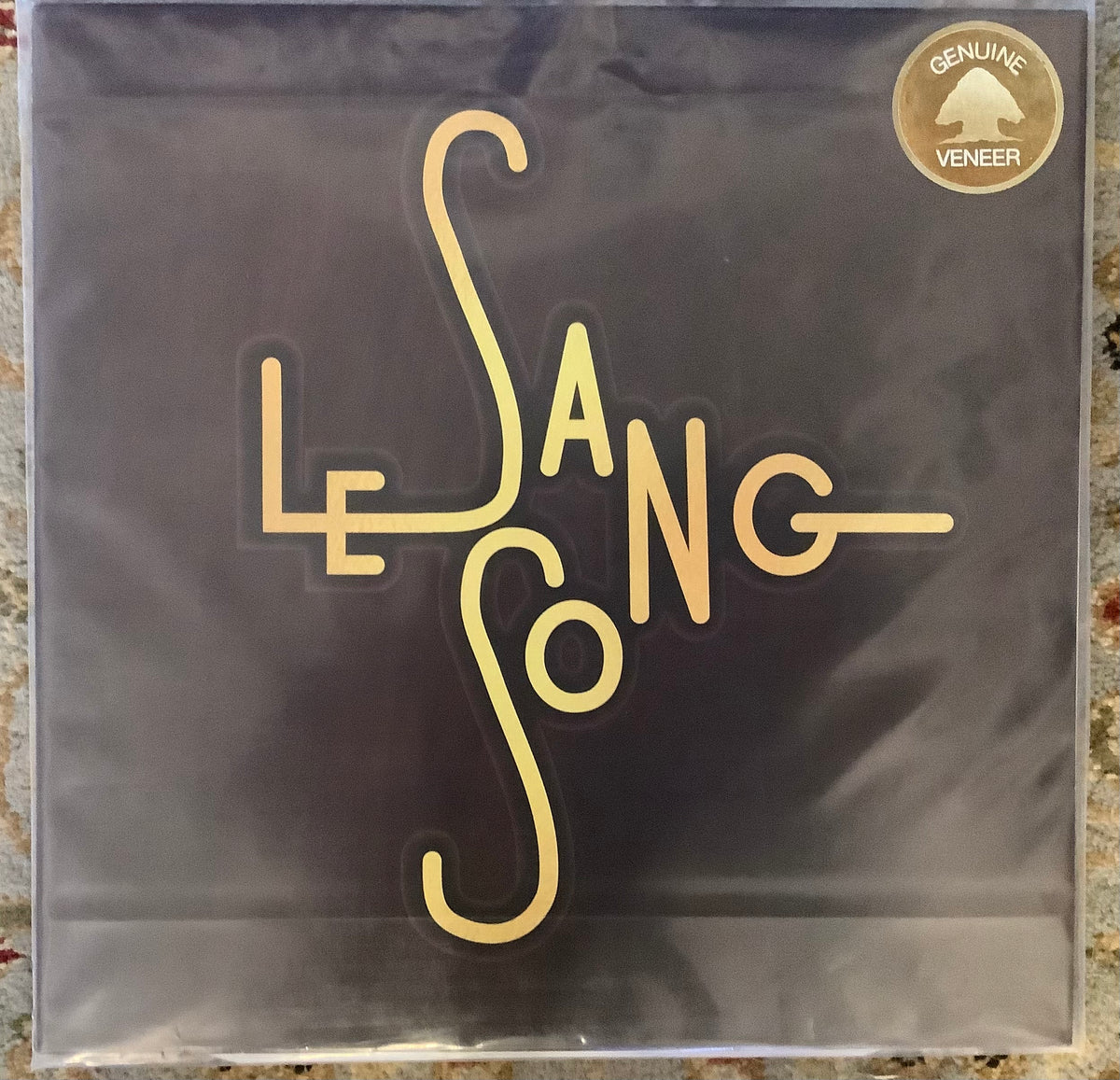 Le Sang Song – Genuine Veneer (Maroon Vinyl LP)
