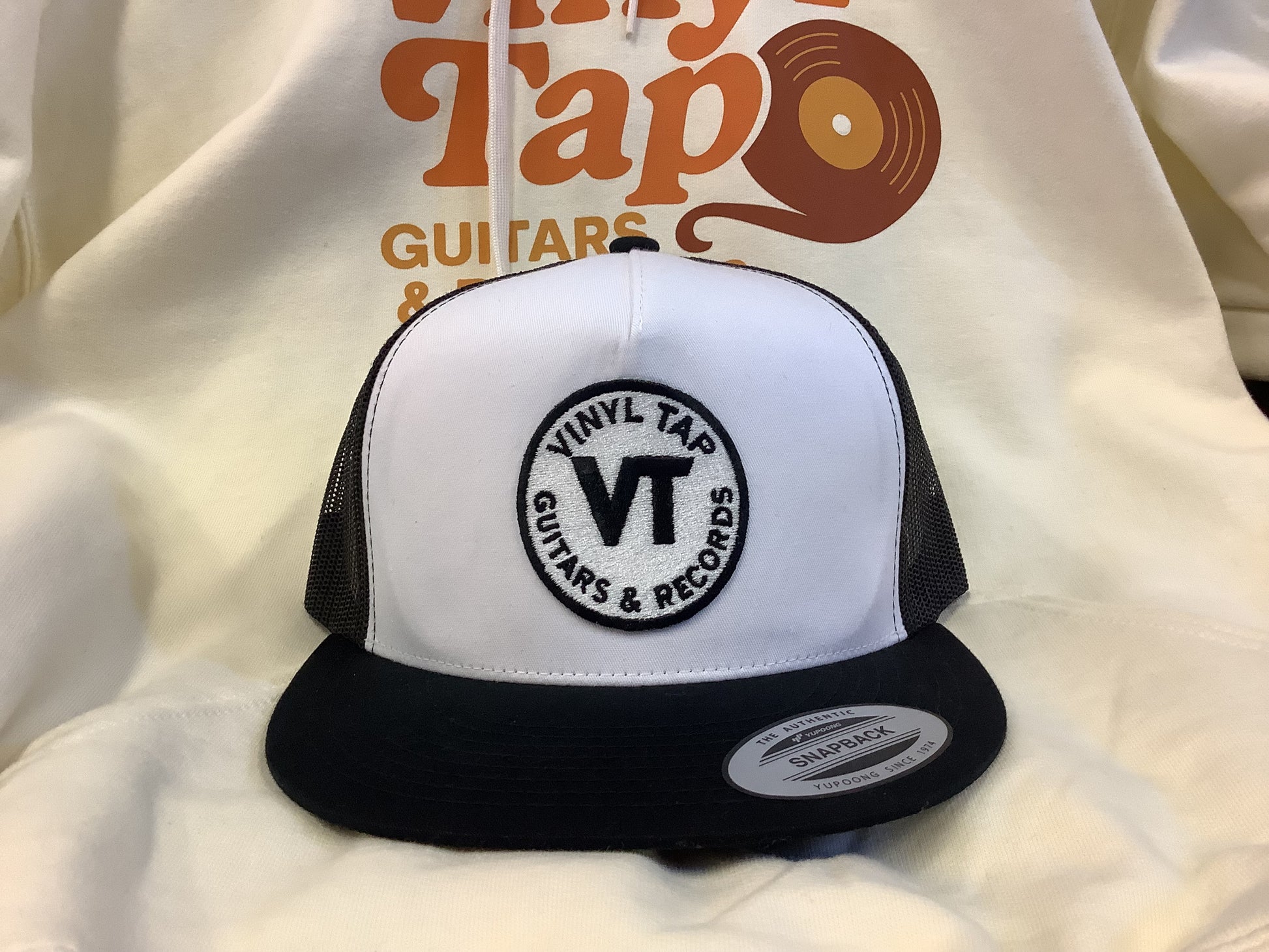 Vinyl Tap Logo Trucker Hat