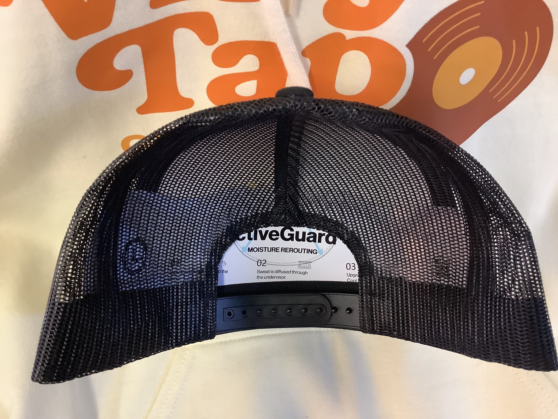 Vinyl Tap Logo Trucker Hat