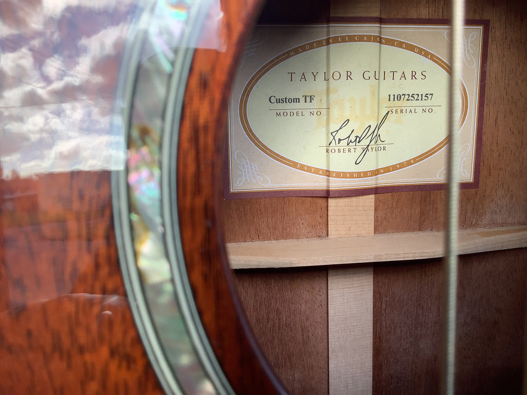 Taylor Custom Shop Grand Concert – Highly Figured Mahogany – Running Horses Inlay