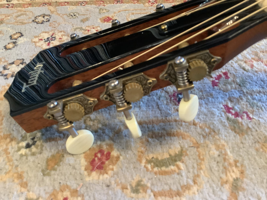 Taylor Custom Shop Grand Concert – Highly Figured Mahogany – Running Horses Inlay